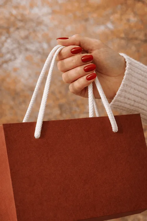 Deep spicy red manicured nails